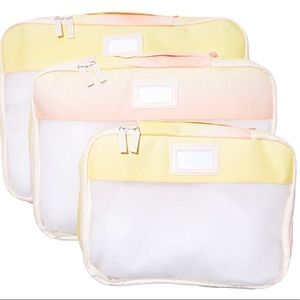 Brand new CALPAK packing cubes in sorbet